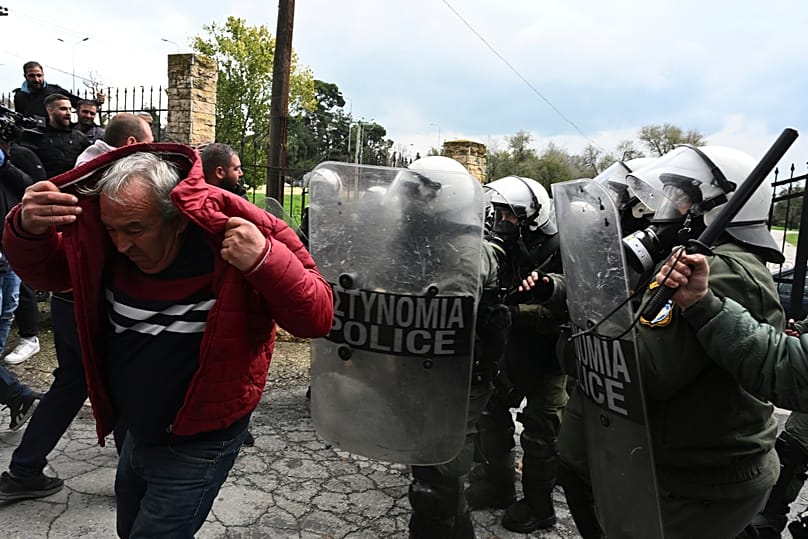Riot police stop farmers trying to block the main access road to Thessaloniki's international airport, 5 December, 2025