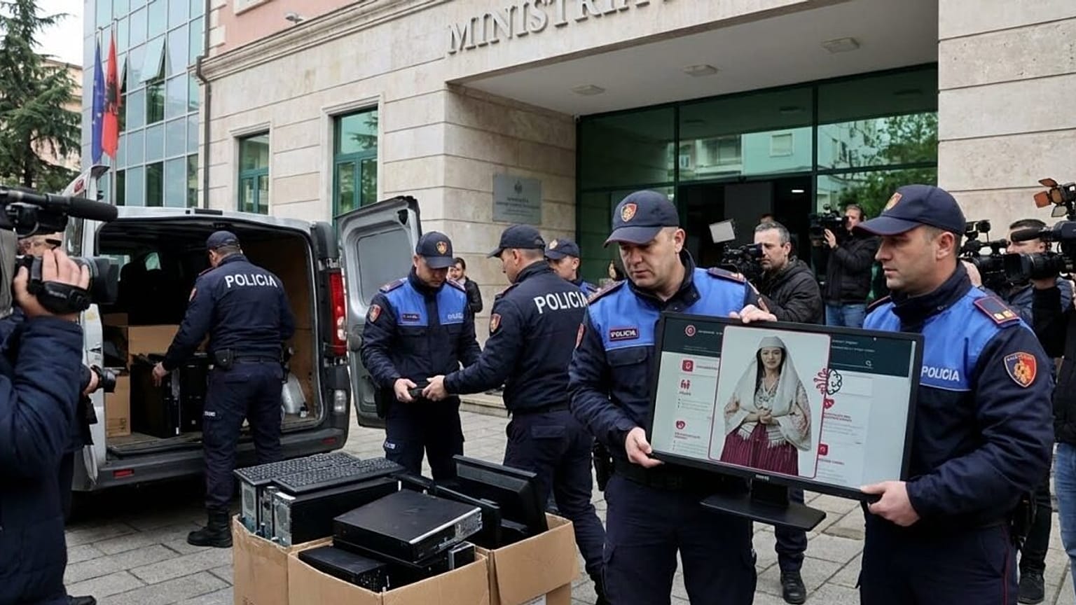 Görselde bir bilgisayar ekranındaki yapay zeka bakan tutuklanıyormuş gibi resmediliyor.