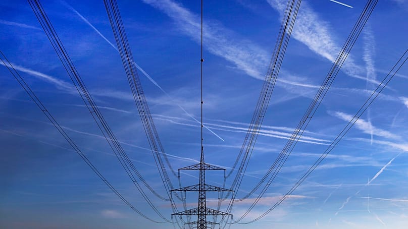 High power cables hang from a pole in a field in Hattersheim, Germany. November 2017. 