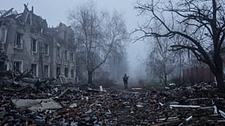 A Ukrainian soldier walks down a street in the frontline town of Kostyantynivka, a site of heavy battles with Russian troops in the Donetsk region, Ukraine, Nov. 28, 2025. 