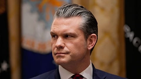 Defence Secretary Pete Hegseth listens as President Donald Trump speaks during a Cabinet meeting at the White House, Tuesday, Dec. 2, 2025, in Washington. 