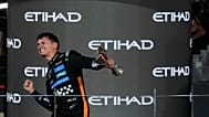 McLaren driver Lando Norris of Britain celebrates after becoming a world champion after the Formula One Abu Dhabi Grand Prix, in Abu Dhabi, UAE, Sunday, Dec. 7, 2025