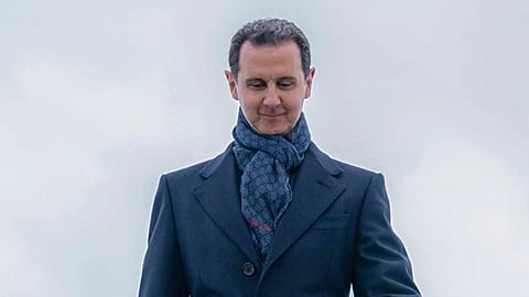 ARCHIVO: Bashar al-Assad desciende del avión a su llegada al aeropuerto de Vnukovo en Moscú, el 14 de marzo de 2023.