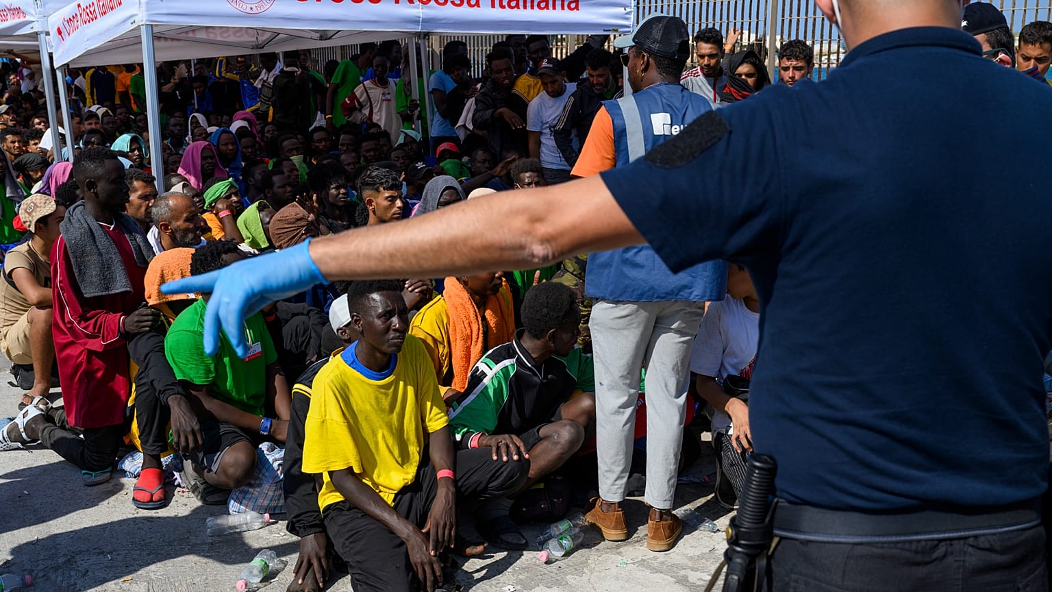 Migrants wait to be transferred from Lampedusa Island, Italy, Sept. 15, 2023.