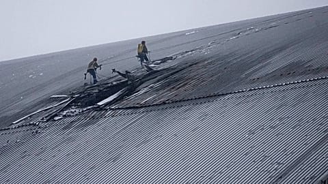 Вид на здание защитной оболочки, защищающее остатки реактора номер четыре на бывшей Чернобыльской атомной электростанции, 14 февраля 2025 года