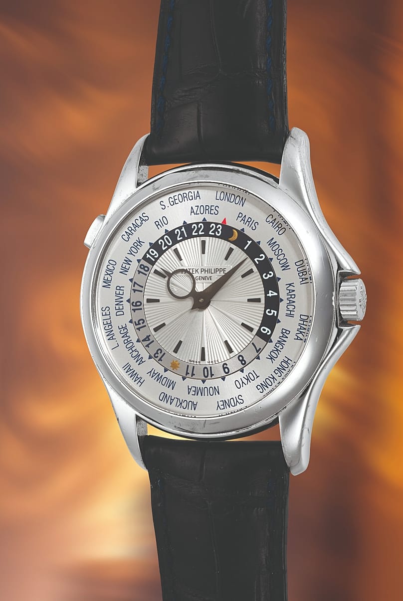 Patek Philippe World Time, vers 2008, réf. 5130G, en or blanc 18 k avec cadran guilloché.