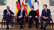 Germany's  Friedrich Merz, Britain's Keir Starmer, Ukraine's Volodymyr Zelenskyy and France's Emmanuel Macron meet at 10 Downing Street, in London on 8 Dec 2025. 