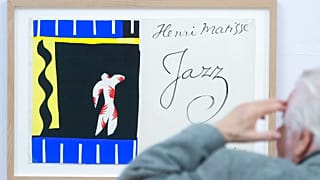 FILE: A man looks to the stencil printing 'Jazz' (1947, The Clown) in the Henri Matisse exhibition 'My curved lines are not crazy' in Apolda, Germany, Thursday, Sept. 25, 2014