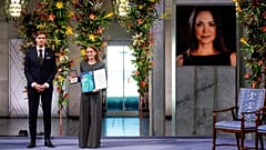 The daughter of the Nobel Peace Prize laureate, Ana Corina Sosa, accepts the award on behalf of her mother at Oslo City Hall, 10 December 2025