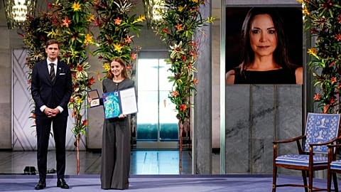 The daughter of the Nobel Peace Prize laureate, Ana Corina Sosa, accepts the award on behalf of her mother at Oslo City Hall, 10 December 2025