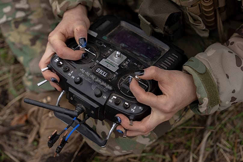A Ukrainian FPV drone operator from the third assault brigade pilots an FPV drone in Kharkiv region, Ukraine.