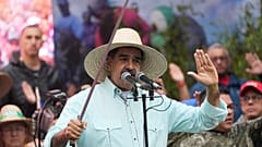 FILE: President Nicolas Maduro addresses supporters during a rally marking the anniversary of the Battle of Santa Ines, in Caracas, 10 December 2025