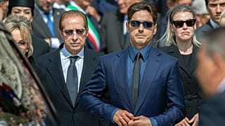 FILE. Family members of former Italian Premier Silvio Berlusconi, from left, daughter Marina, brother Paolo, son Pier Silvio and daughter Eleonora at the funeral in Milan.