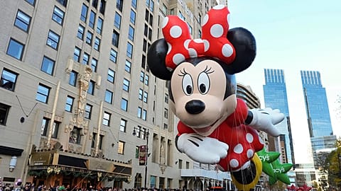 FILE - Disney's Minnie Mouse balloon floats down Central Park South during the Macy's Thanksgiving Day Parade, 27 November 2025, in New York. 