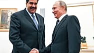 الرئيس الروسي فلاديمير بوتين و رئيس فنزويلا نيكولاس مادورو
