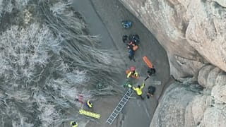 This image taken from drone footage provided by Grand County Search and Rescue shows a man being freed from quicksand Sunday