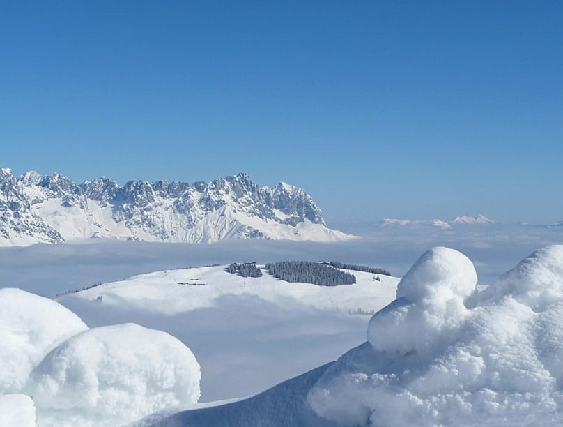 A view of snow-covered mountains in Kitzbühel