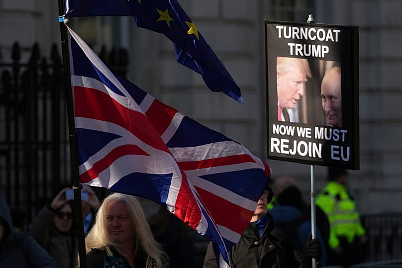 Ukrainian and Anti-Brexit supporters outside Downing Street with flags and placards as Prime Minister Keir Starmer holds a Ukraine Summit in London, 2 March 2025