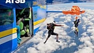 In this imaged taken from a video, a skydiver is caught on the wing of a plane as he exited the aircraft in Tully, North Queensland, Sept.20, 2025.