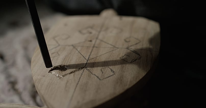 Traditional workshop. Patterning into the surface of Kobuz