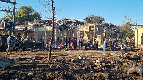 People check damaged buildings at the hospital that was allegedly hit by a military air strike in Mrauk-U township in Rakhine state, Myanmar, Thursday, Dec.11, 2025