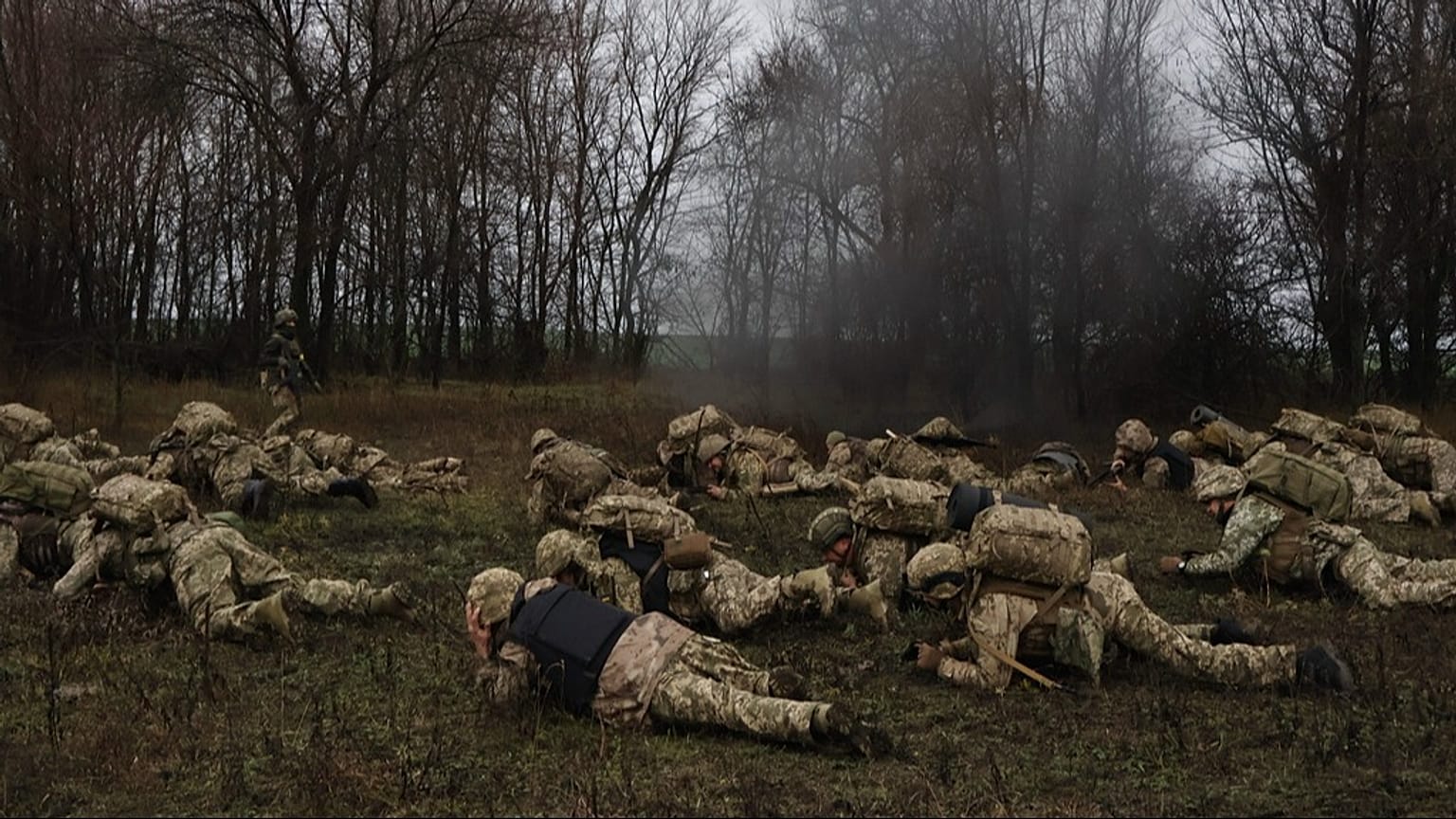 In this photo provided by Ukraine's 65th Mechanised Brigade press service, recruits attend drills at a training ground in the Zaporizhzhia, Ukraine, Friday, Dec. 12, 2025