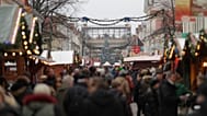FILE: A Christmas market is crowded a day after a suspicious object was found in Potsdam, 2 December 2017