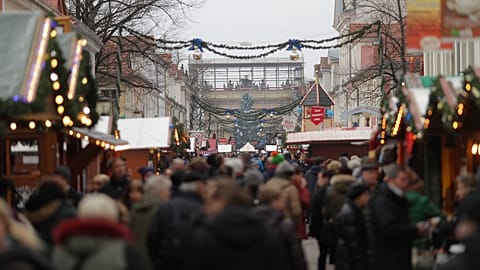 FILE: A Christmas market is crowded a day after a suspicious object was found in Potsdam, 2 December 2017