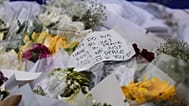 A note is left attached to a flower at a tribute for shooting victims outside the Bondi Pavilion at Sydney's Bondi Beach, Monday, Dec. 15, 2025, a day after a shooting. 