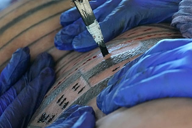 Researchers find evidence of youngest-ever children tattooed