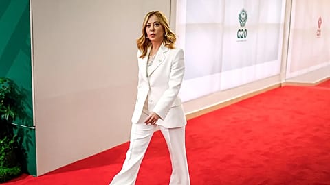 Italy's Prime Minister Giorgia Meloni arrives for the second day of the G20 Leaders' Summit, in Johannesburg, South Africa, Sunday, Nov. 23, 2025.