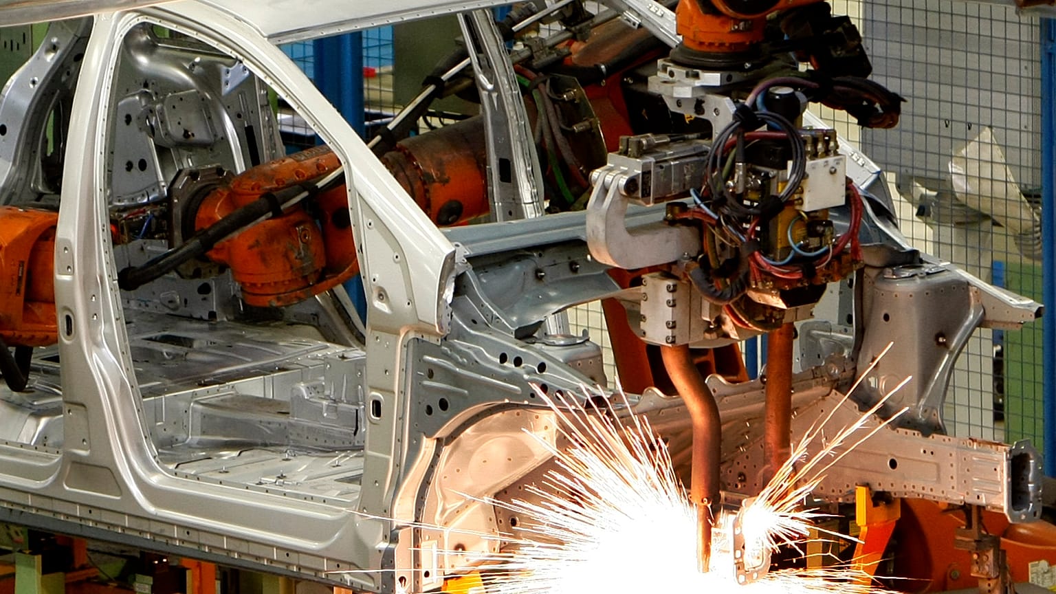 A robot is welding on the carriage of a Mercedes-Benz B-class on the production line in the Mercedes-Benz production site in Rastatt, Germany, 