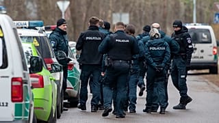 Police officers patrol in Vilnius, 13 March, 2024