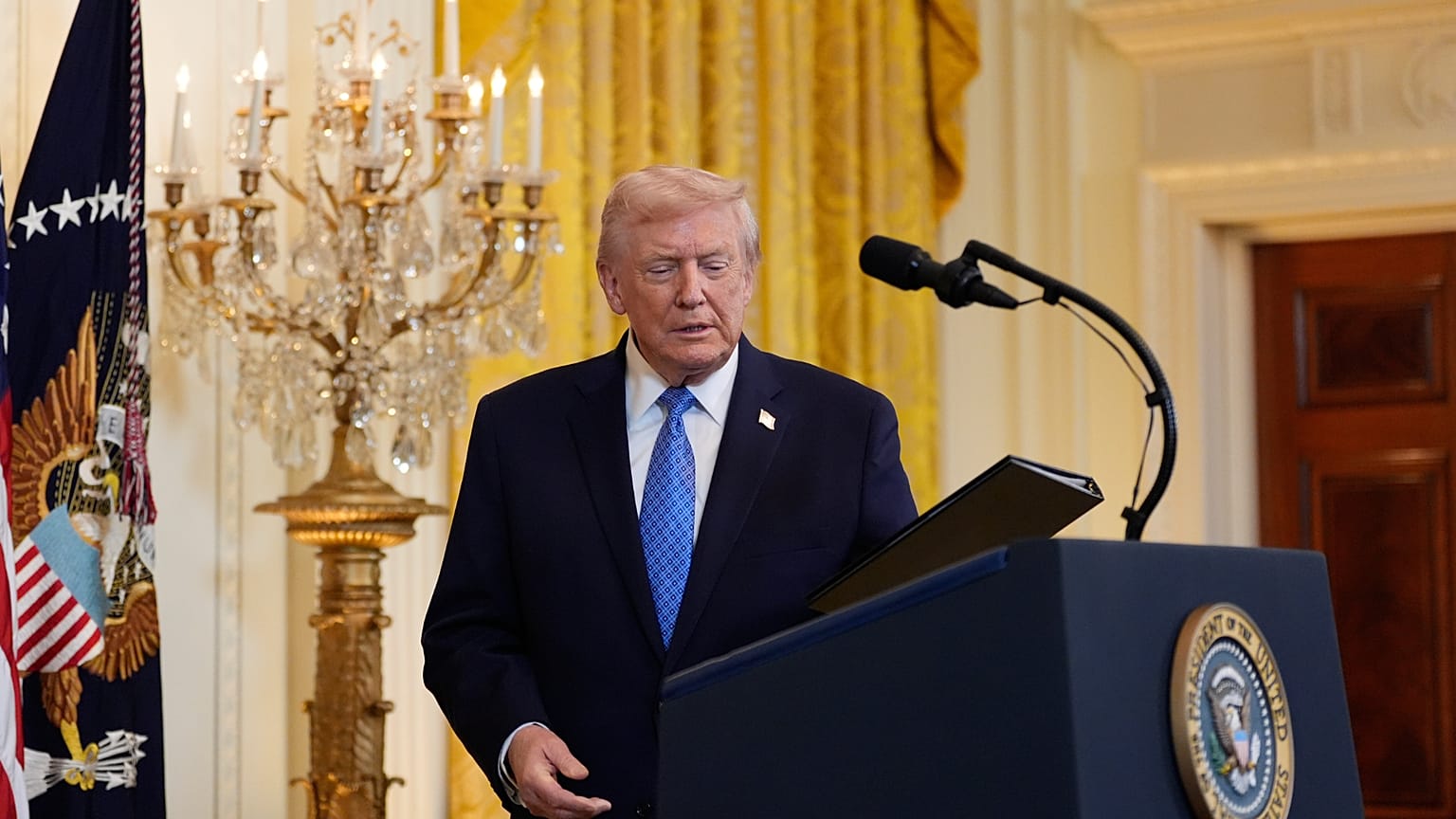 President Donald Trump arrives to speak during a Hanukkah reception in the East Room of the White House, Tuesday, Dec. 16, 2025, in Washington.