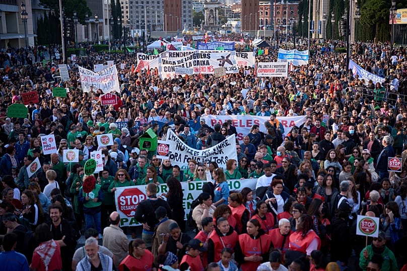 People gather during a demonstration to protest high housing costs in Barcelona, 5 April, 2025