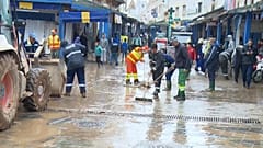 Moroccans clean streets in Safi, Morocco, after deadly floods, Dec. 17, 2025