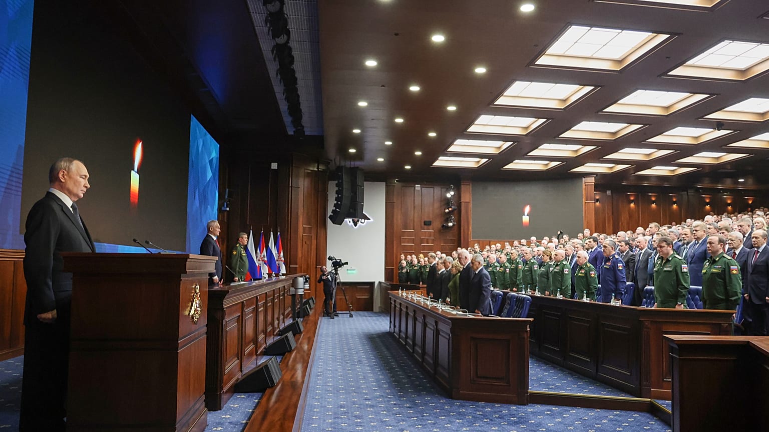 Russian President Vladimir Putin stands while attending a minute of silence during the annual board meeting of the country's Defence Ministry in Moscow, Dec 17, 2025