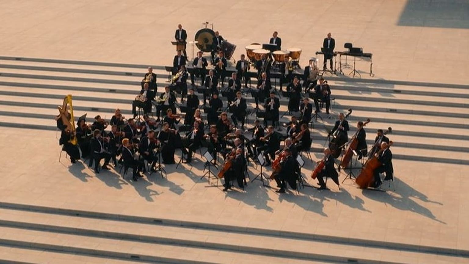 A scene from Nabd Qatar featuring the Qatar Philharmonic Orchestra 