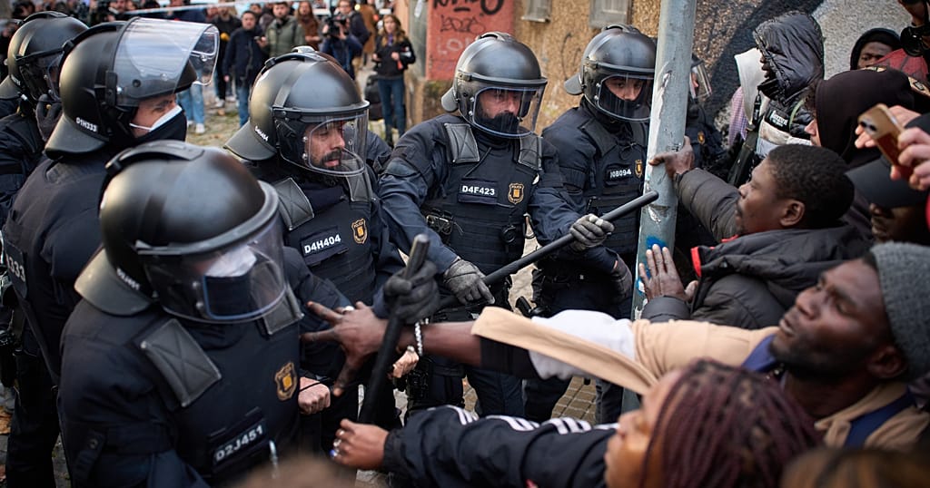 Spanish police evict hundreds of mostly illegal migrants living in a squat Spanish police evict hundreds of mostly illegal migrants living in a squat
