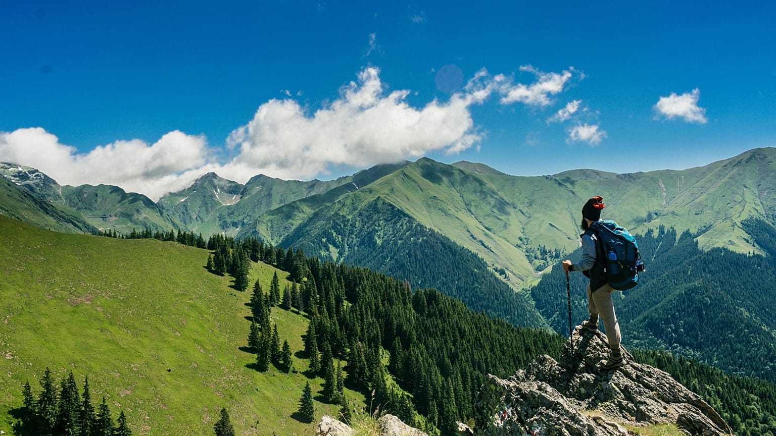 A man hiking a mountain