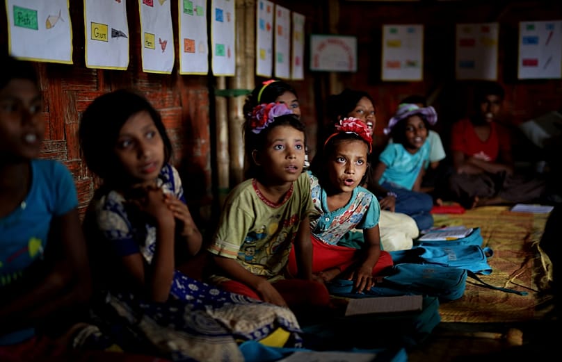 Rohingya refugee children attend a UNICEF run school in the Balukhali refugee camp, 27 August, 2018 