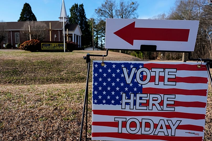 A voting sign is seen near a voting center at Croft Baptist Church in South Carolina.