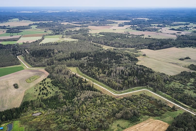 A drone shows an aerial view of the Estonia-Russia border near Vinski, 15 September, 2025