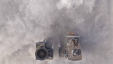 An aerial view of buildings peaking through a dense layer of fog in Sarajevo, Bosnia, 18 December 2025. 