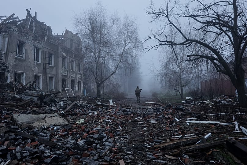 FILE: A Ukrainian soldier goes along a street in the town of Kostyantynivka, the site of heavy battles with the Russian troops in the Donetsk region, 28 November 2025