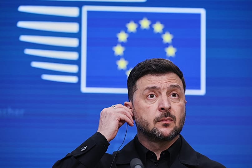 Ukraine's President Volodymyr Zelenskyy prepares to address a media conference during the EU Summit in Brussels, 18 December 2025