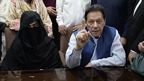 FILE - Pakistan's former Prime Minister Imran Khan, right, and Bushra Bibi,his wife, July 17, 2023.