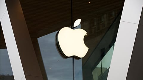 FILE - An Apple logo adorns the facade of the downtown Brooklyn Apple store on March 14, 2020, in New York.
