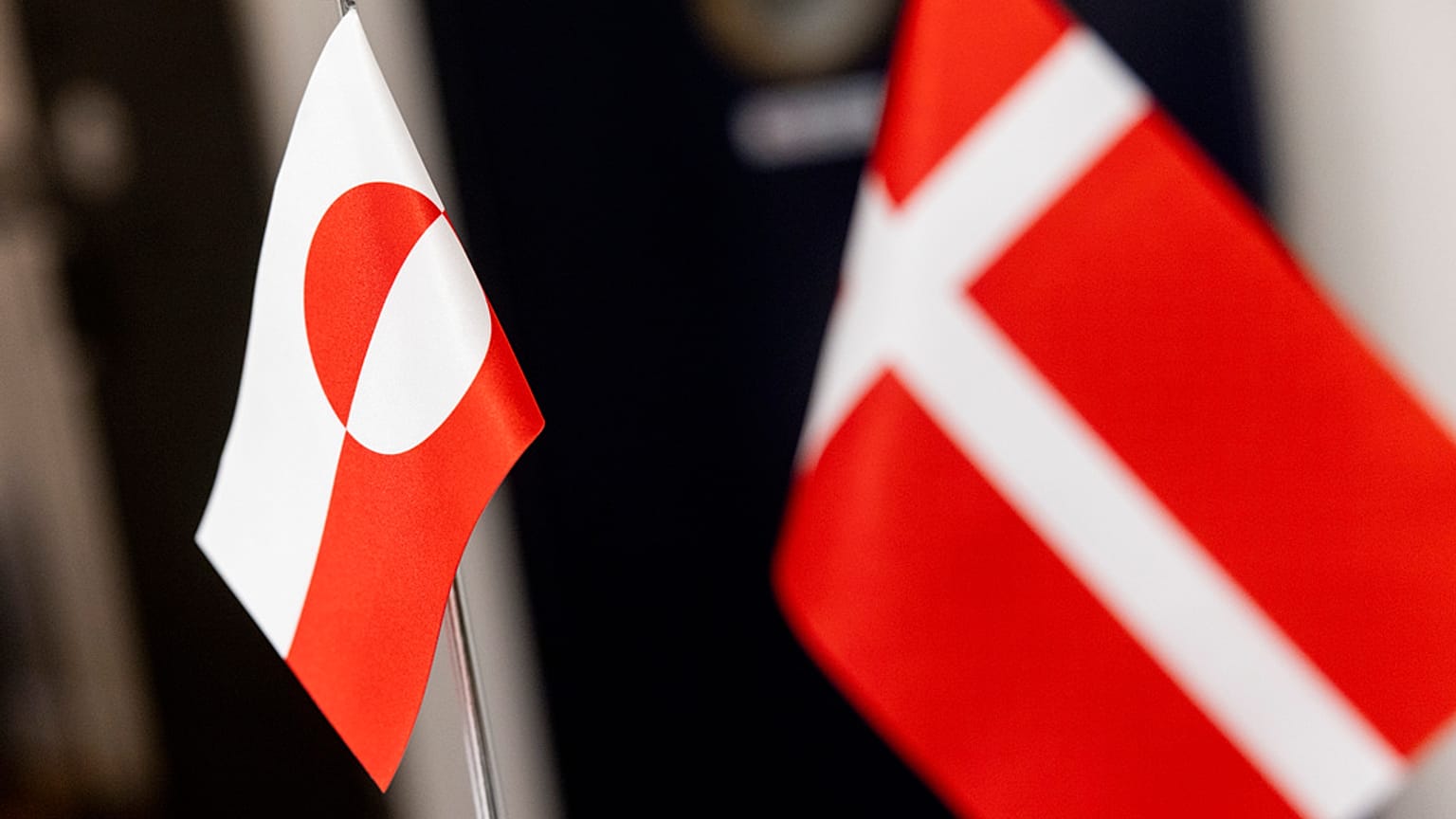 The flag of Greenland and the flag of Denmark at a government meeting in Copenhagen, 8 January 2025