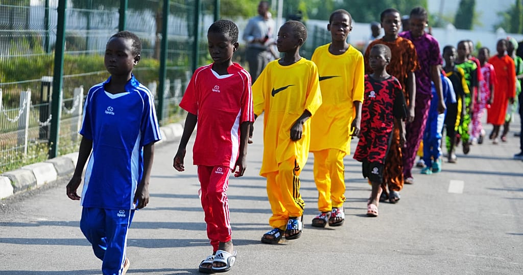 Nigeria says it will increase security around schools as it welcomes back abducted students